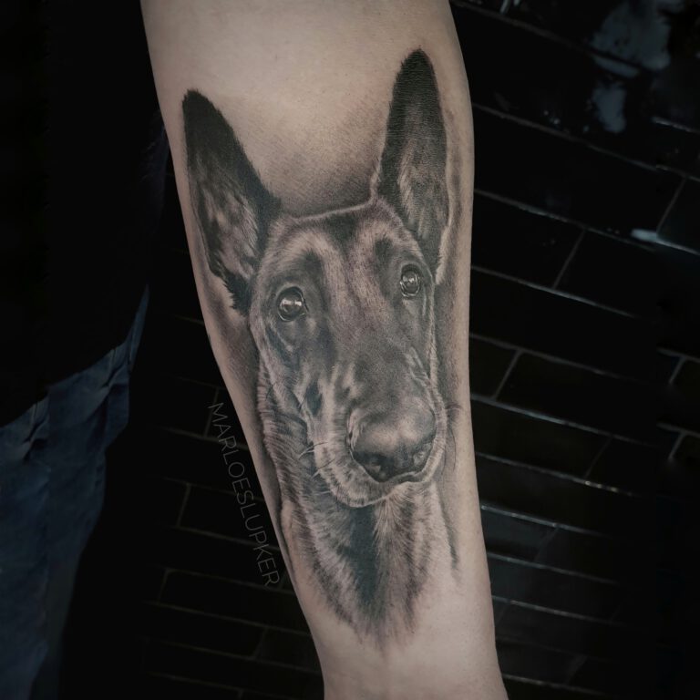 black and grey realistic dog portrait tattoo by marloes lupker