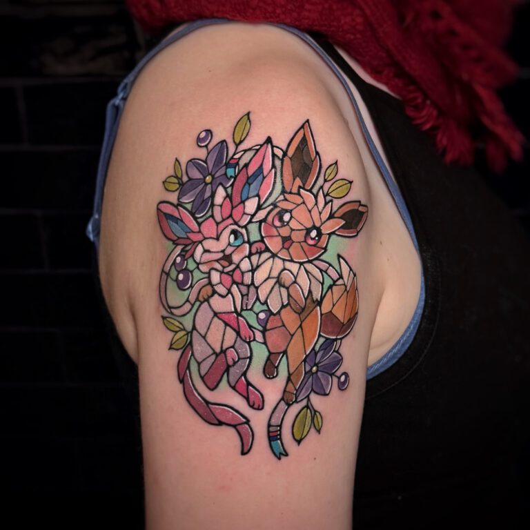 eevee and sylveon stained glass style tattoo by marloes lupker
