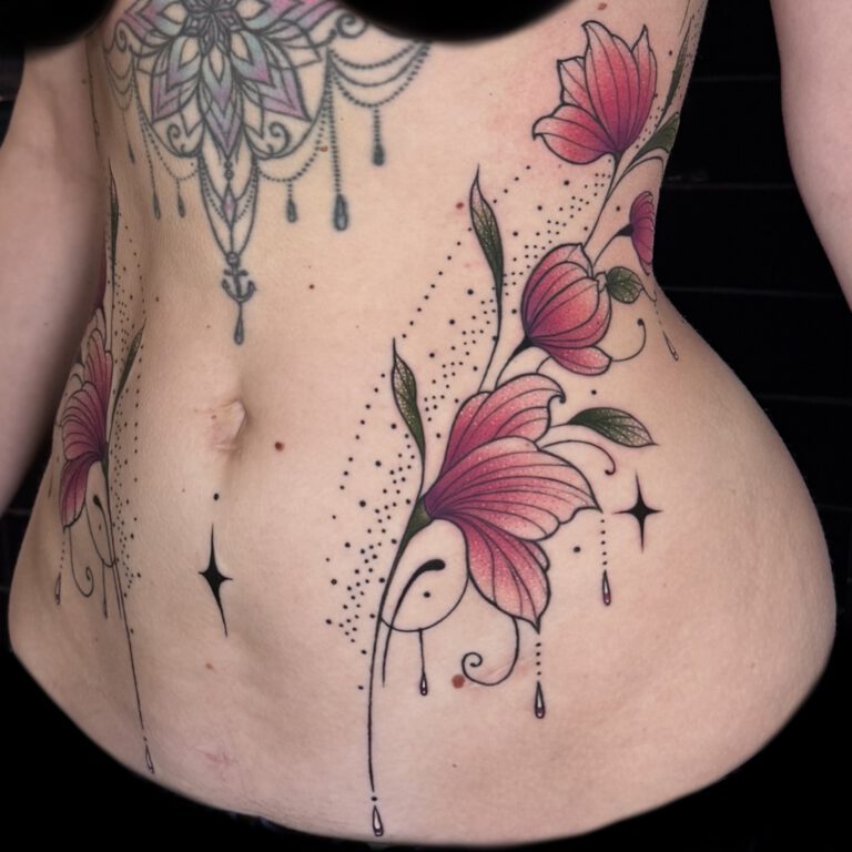 beautiful feminine sexy neotraditional stomach flower ornaments and dots tattoo by marloes lupker