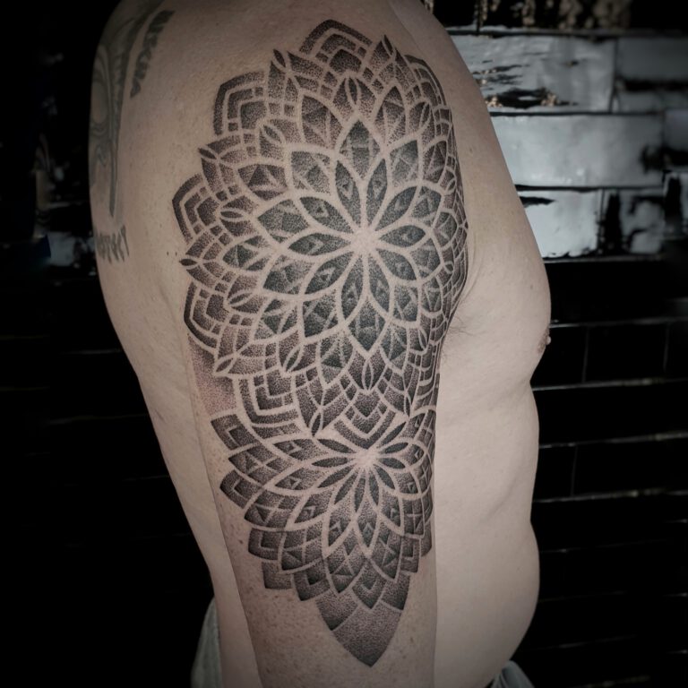 geometric dotwork mandala tattoo by Marloes Lupker