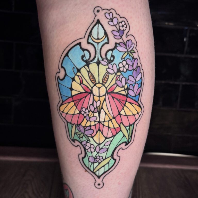 rosy maple moth stained glass tattoo by marloes lupker