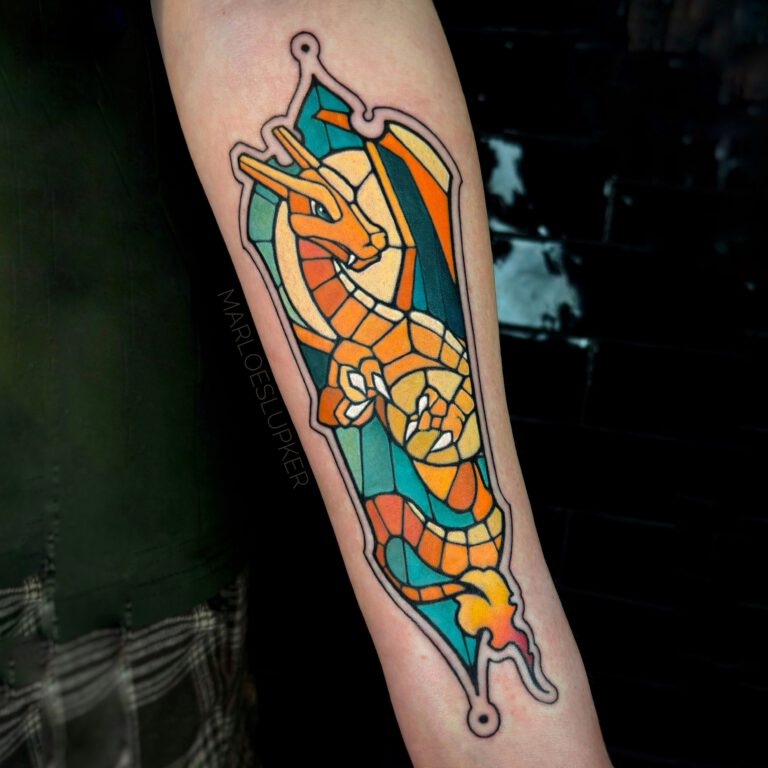charizard in stained glass pokémon tattoo by marloes lupker